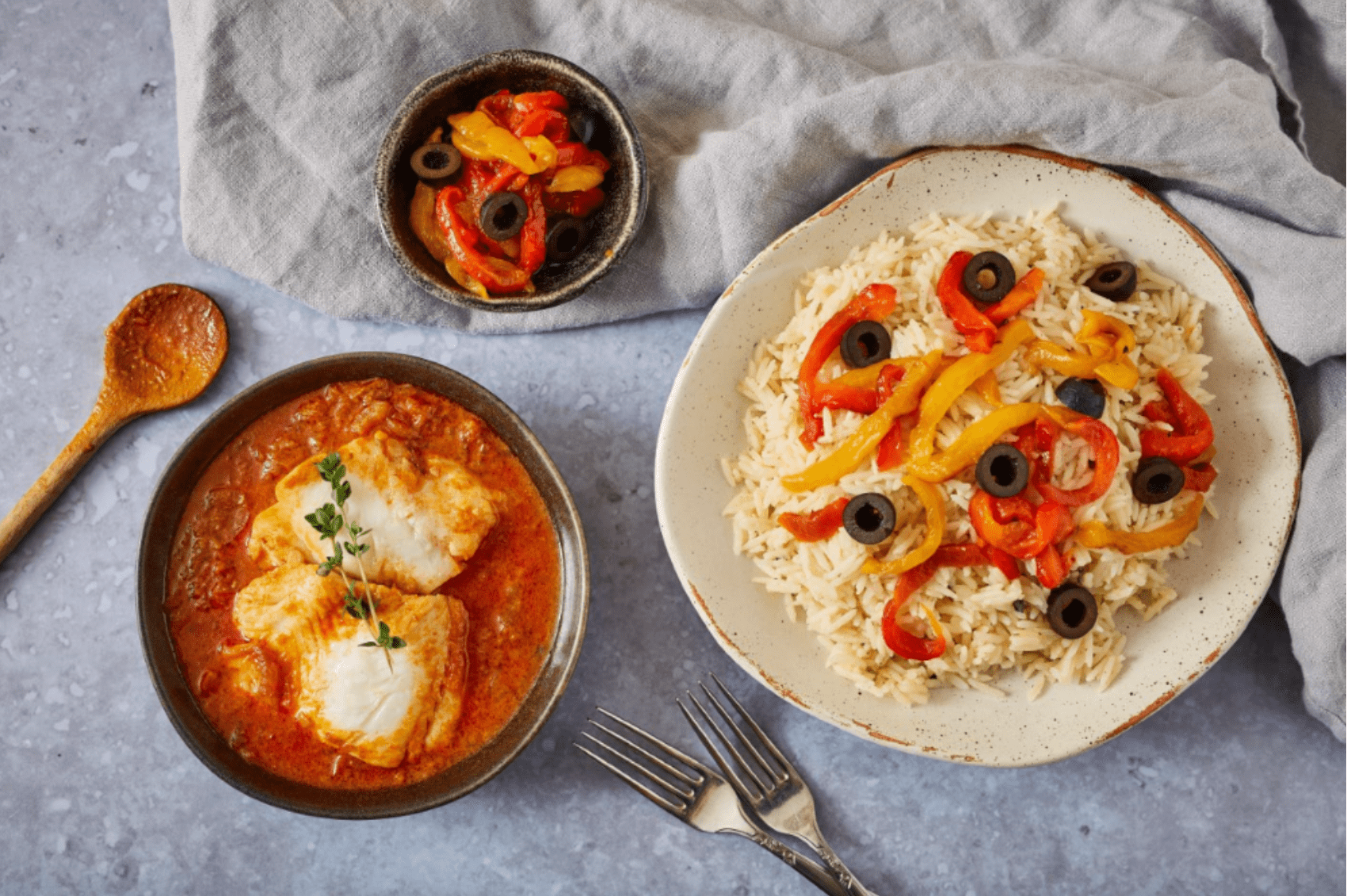 Fish yassa with butter rice, olives and roasted sweet peppers | Tilda